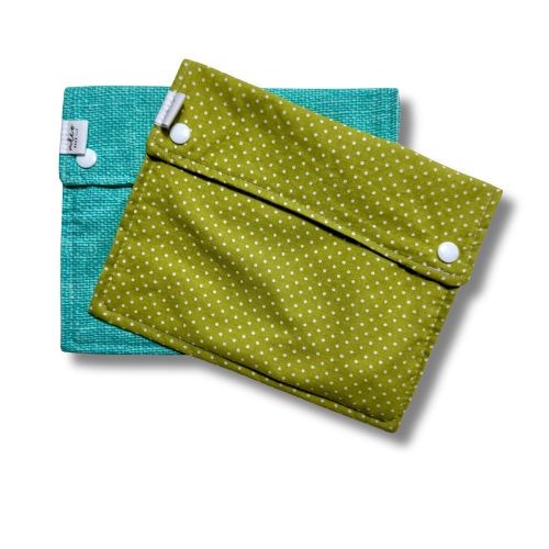 Green and aqua fabric bags with snaps