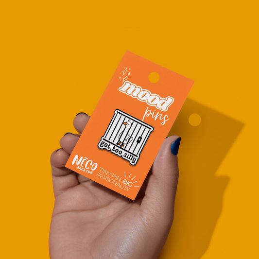 Got Too Silly goose enamel pin on orange NECO Current Mood Pins display card
