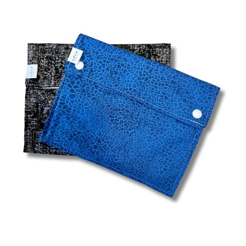blue and black fabric bags with snaps