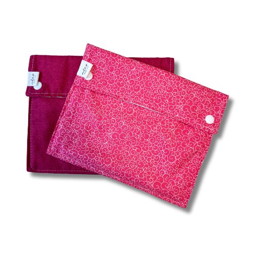 dark and medium pink fabric bags with snaps
