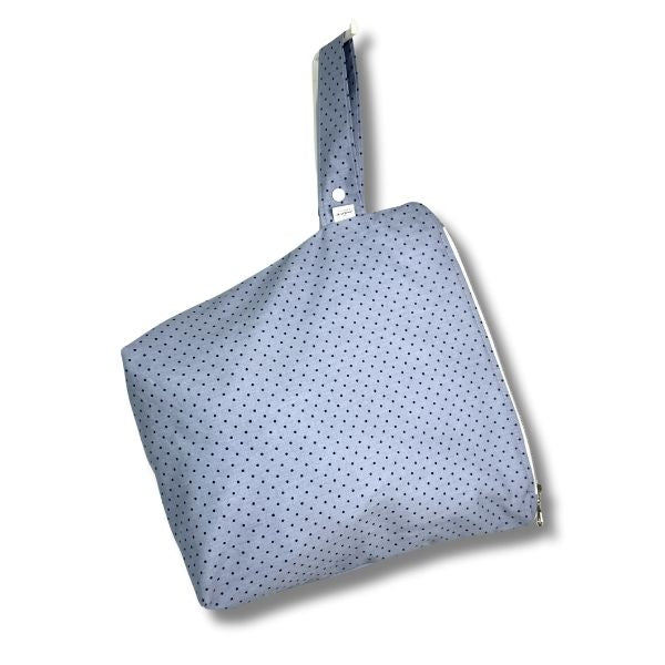 Blue polka dot bag on a white background