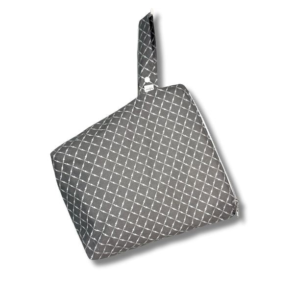 Gray geometric bag with a white grid pattern on a white background