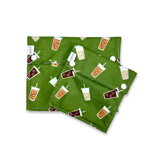 Green snack bags with drink pattern on a white background