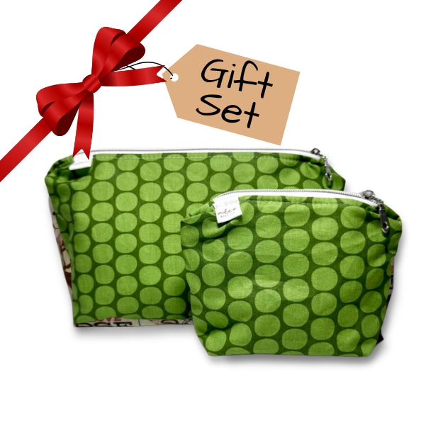 Green polka dot pouches with a red ribbon and 'Gift Set' tag on a white background