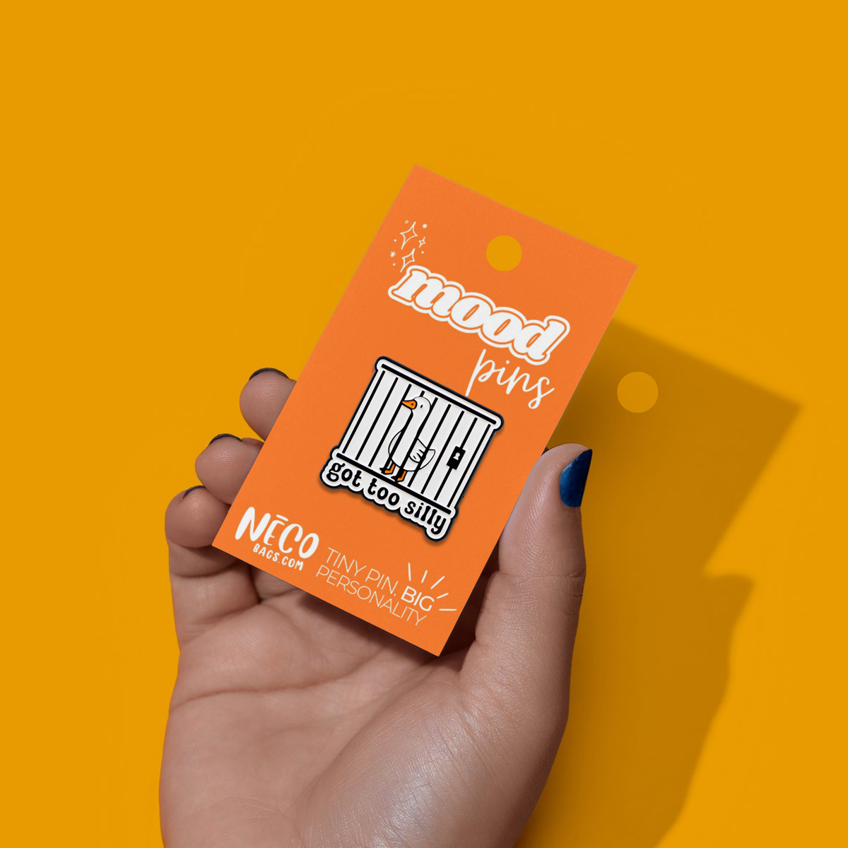 Got Too Silly goose enamel pin on orange NECO Current Mood Pins display card