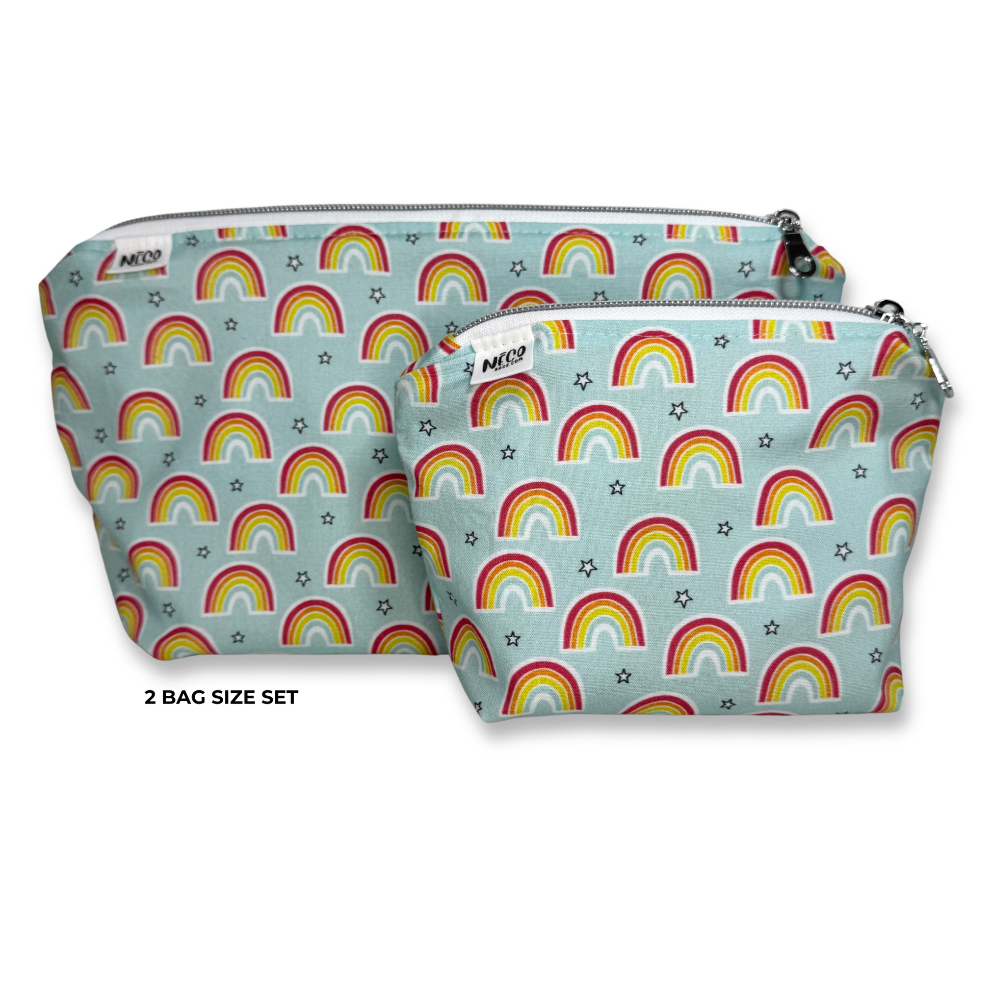Two zippered pouches in a matching set, featuring a light blue background with a repeating rainbow and star pattern. The larger pouch is positioned behind the smaller one, with the text '2 BAG SIZE SET' printed below on a white background. Machine washable cosmetic bags.