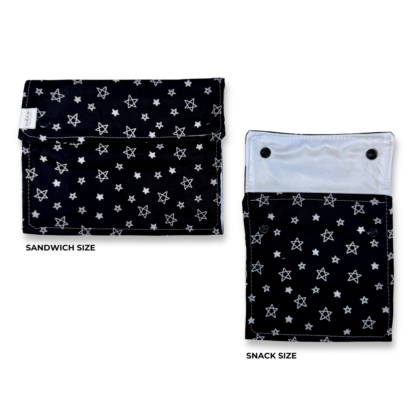 Two fabric snack pouches shown on a white background, labeled SANDWICH SIZE and SNACK SIZE. Both pouches have a black base with a white star pattern and white stitching. Machine Washable snack and sandwich bags