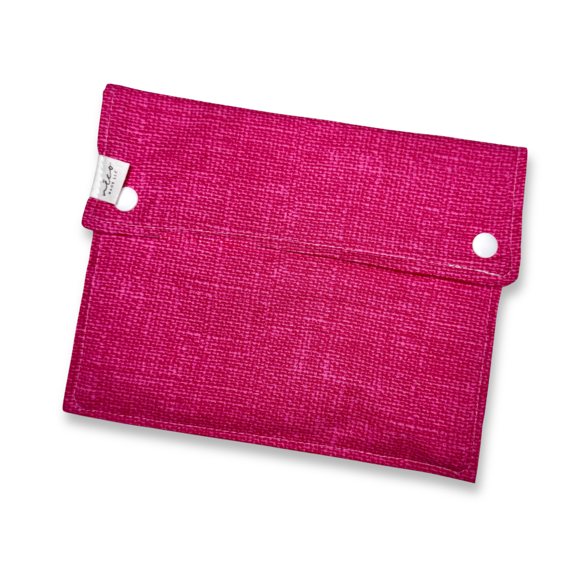 Pink fabric pouch with white buttons on a white background