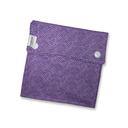 Purple fabric pouch with a textured pattern on a white background