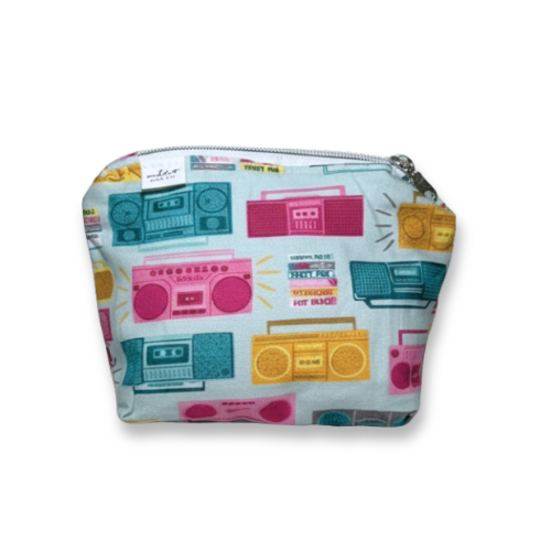 Pouch with retro radio and cassette tape pattern on a white background