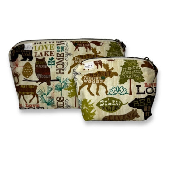 Two fabric pouches with nature-themed designs on a white background